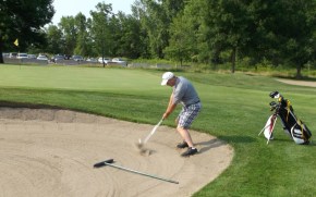 Kirk out of the sand for par!